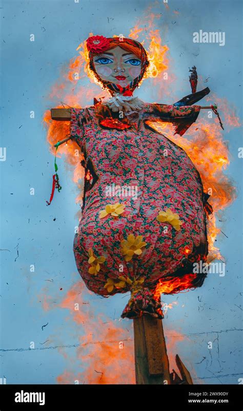 children carrying a handmade effigy of Morena in a procession to symbolize the farewell to winter