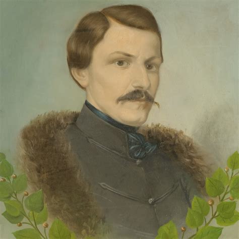 Portrét autora v pracovni s historickými dokumentmi a mapami slovenských regiónov