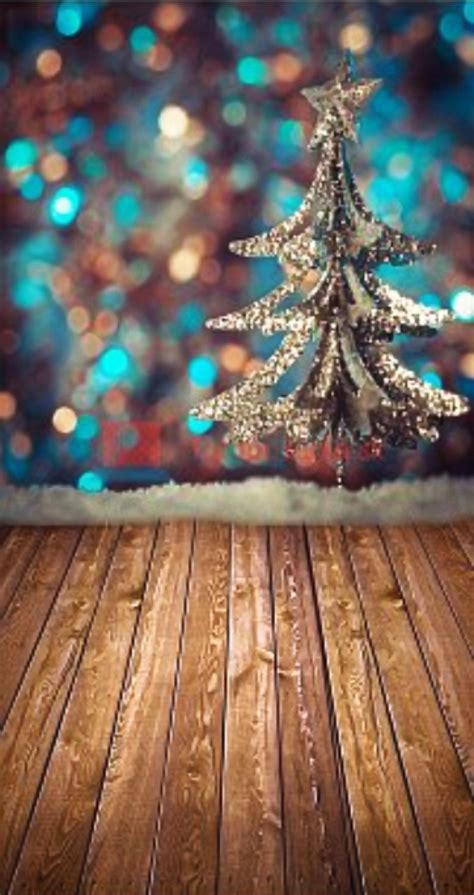 Vianočné fotopozadie s motívom útulnej obývačky s ozdobeným stromčekom.