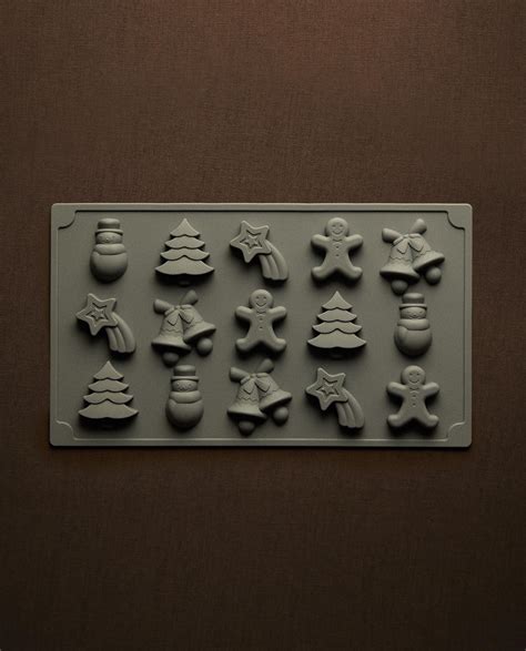 Ilustračná fotografia silikónovej formy na perníčky s rôznymi vianočnými motívmi.