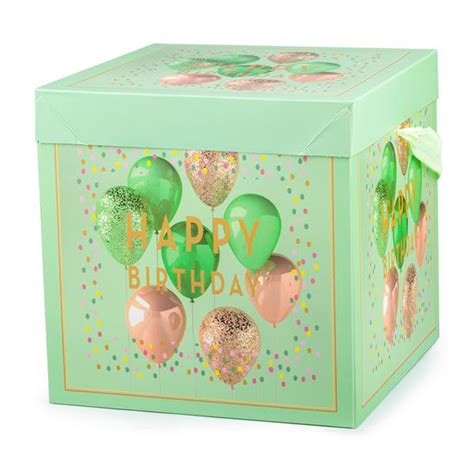 dekoratívna krabička naplnená bankovkami a ozdobená stuhou