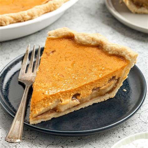 Assortment of traditional American Christmas desserts, including pumpkin pie and apple pie