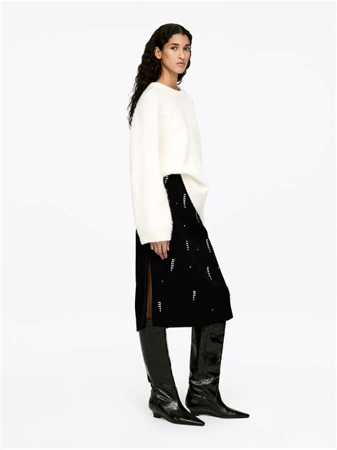 Príklady vrstvenia s bielym svetrom