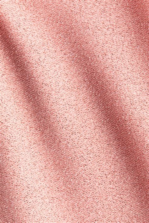 Detailná fotografia štruktúry saténovej tkaniny s viditeľným leskom a jemným tkaním