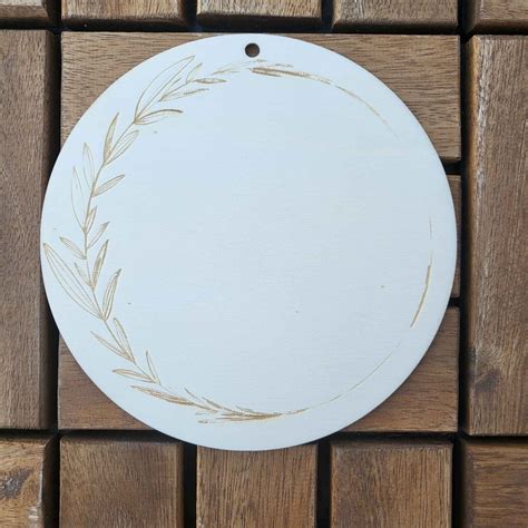 drevený kruh obmotaný jutovým povrázkom