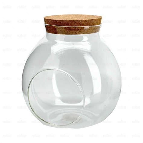 Váza plnená guľami s korkovou podložkou a sviečkami