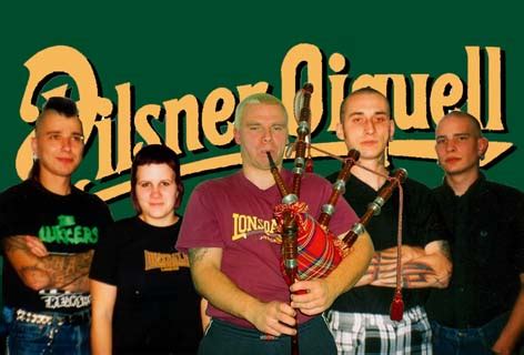 Fotografia členov kapely Pilsner Oiquell počas vystúpenia