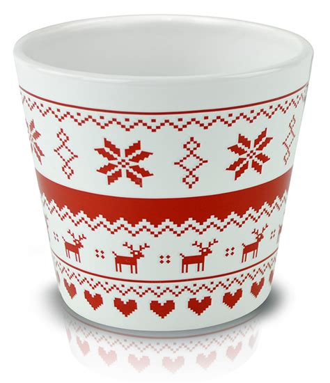 Vianočný kvetináč zdobený guľami, šuškami a výraznou mašľou.