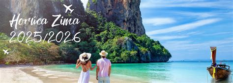 Fotografia páru v strednom veku oddychujúceho na pláži pri mori