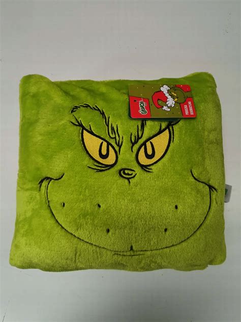 Zelený chlpatý Grinch s nenávistným výrazom