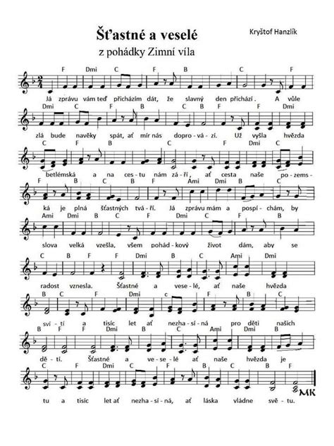 Záber na gitaru a notový zápis vianočnej piesne