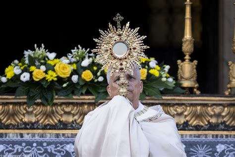 Thematic photo of a monstrance with the Blessed Sacrament during a Corpus Christi procession