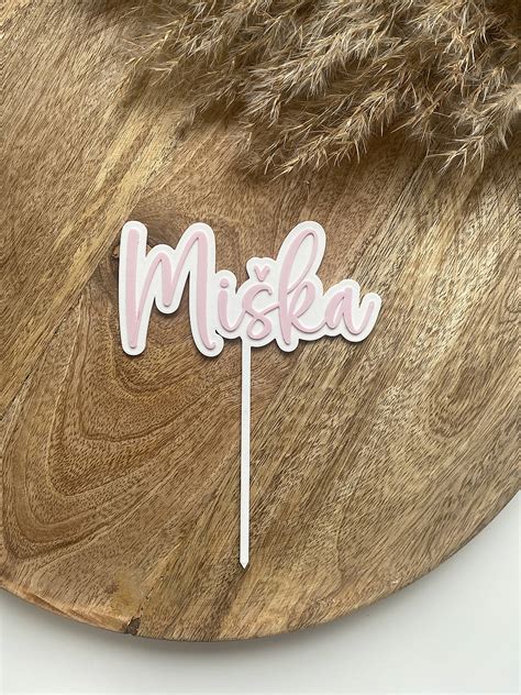 Dvojbalenie zápichov na tortu s motívmi kríža, kalicha a hrozna, jeden zápich s menom.