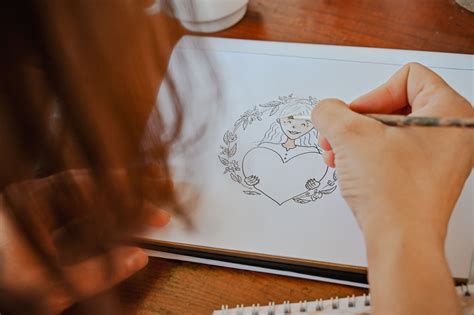 Ilustrácia páru pri tvorbe svadobných novín