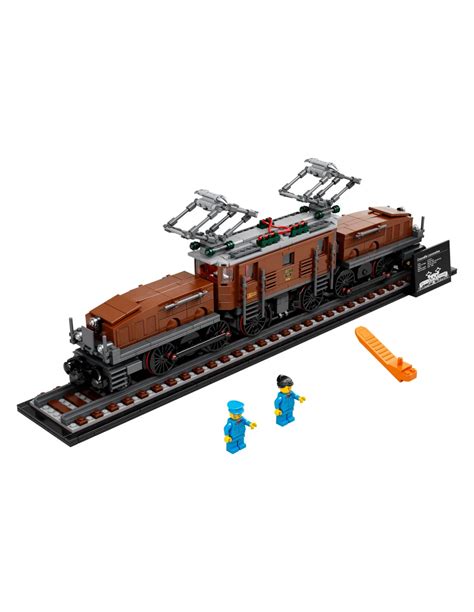 Infografika zobrazujúca evolúciu LEGO vlakov od drevených po moderné motorizované súpravy.