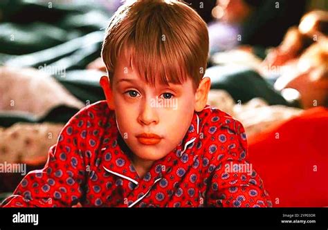 Kevin McCallister s rukami na tvári