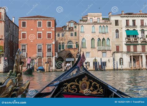 Panoramic view of the Grand Canal with gondolas and historical buildings