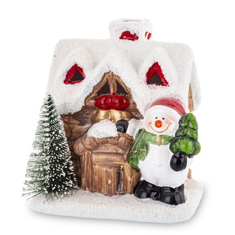 Fotografia elegantnej vianočnej dekorácie s LED snehuliakom v porcelánovej miske