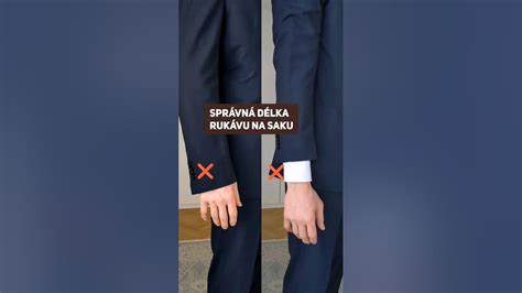Ruky v košeli s francúzskou manžetou a elegantnými manžetovými gombíkmi, vyčnievajúce zo saka