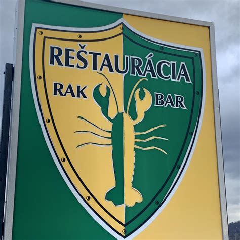 Exteriér reštaurácie Rak Bar s názvom a okolím