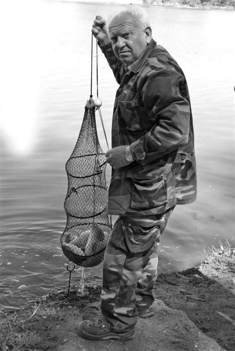 Historické foto zakladajúcich členov Popradsko-Velického rybárskeho spolku