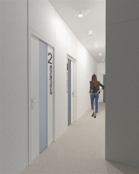 Tematická fotografia moderného interiéru kliniky s personálom v uniformách