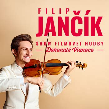 Filip Jančík hrá na husliach na vianočnom koncerte, zvýrazňujúce špeciálny sektor 