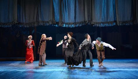Theatrical scene from the musical Jánošík with leading actors and folk costumes