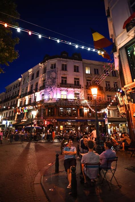 Lively street scene in Sofia at night, with people enjoying bars and cafes
