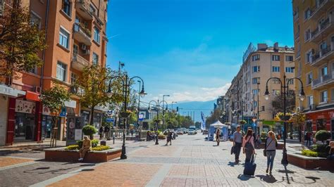 Night photo of Vitosha Boulevard in Sofia, showing illuminated cafes and bars