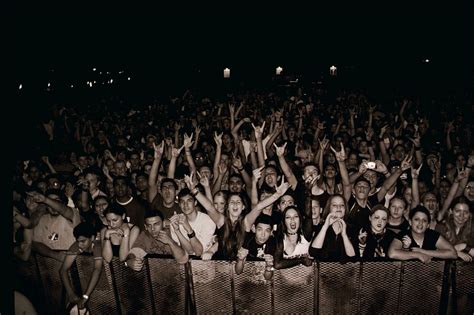 Photo of the memorial concert in Gregorovce, showing the stage and crowd.