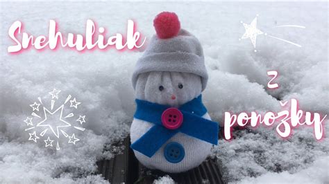 Snehuliak z ponožky plnenej ryžou s gombíkmi a nakreslenou tvárou