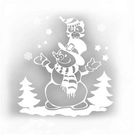 ilustračné foto vianočných vystrihovačiek v okne