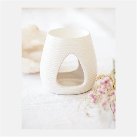 Koláž praktických darčekov: kabelka, hodinky, aroma lampa