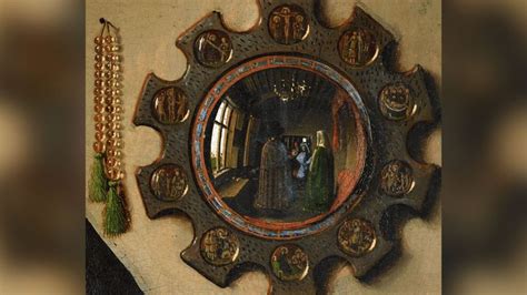 Detail vypuklého zrkadla s medailónmi a signatúrou Jana van Eycka