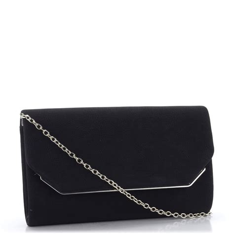 Svadobné doplnky: malá listová kabelka, elegantné topánky, decentné šperky