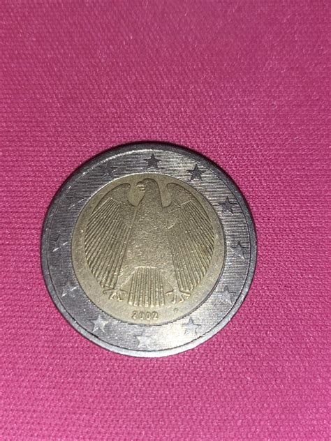 Vyobrazenie pamätnej 2 euro mince s portrétom Štefánika