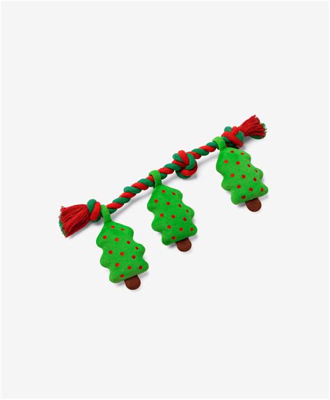 Ilustrácia kresleného psíka v rôznych pozíciách s vianočnými prvkami.