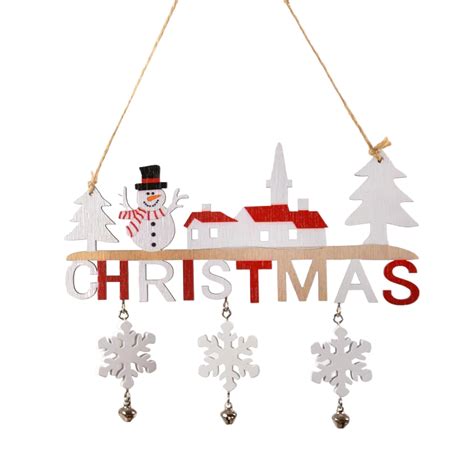 Drevená krabička so snehuliakom na vianočnom stole