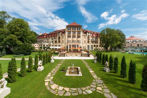 The Thermia Palace Piešťany, hotel facade and surrounding spa island in spring/summer