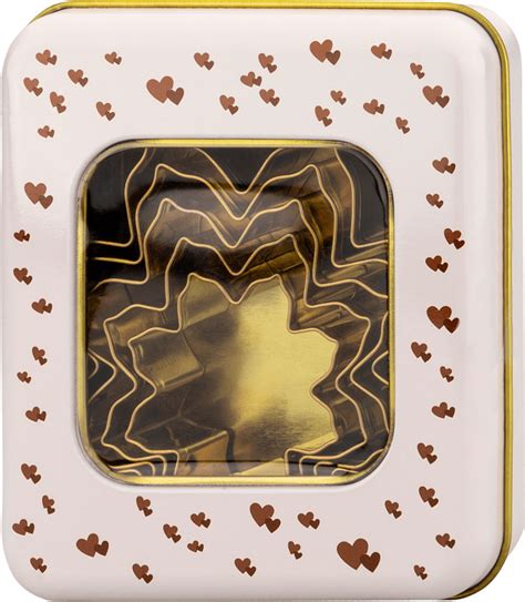 Fotografia sady vykrajovačiek v prírodnom bavlnenom vrecku, pripravená ako darček.