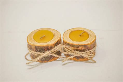 Ručne vyrobený svietnik z pohára s citrusmi a sviečkou