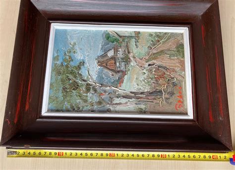 Obraz krajiny s vianočnou tematikou v ráme