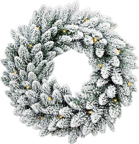 Fotografia: zasnežený veniec zdobený v bielej a modrej farbe