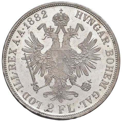 Detail reverzu striebornej mince 2 zlatník z roku 1879 s vyobrazením bohyne Fortune.