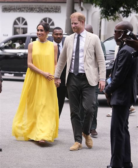 fotografia Meghan Markle v čiernych šatách na svadbe Pippy Middleton